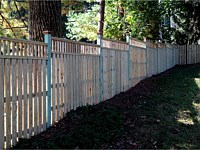 <b>Board on Board Wood Privacy Fence with Closed Spindle Top</b>